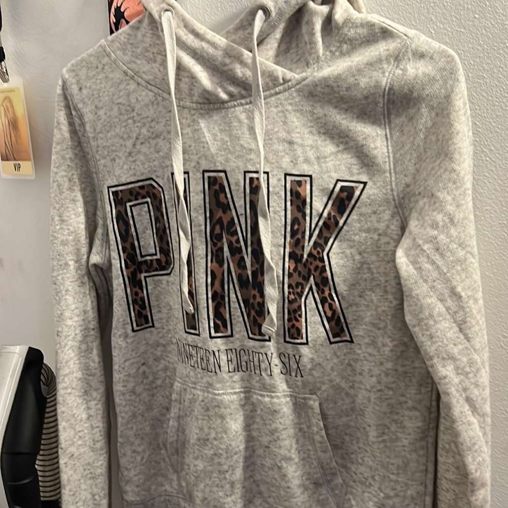 2 pink sweatshirts